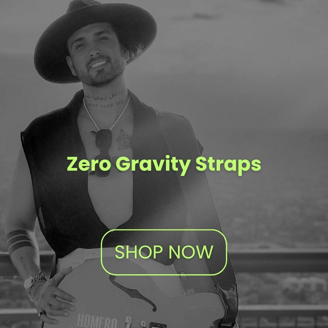 Guitarist wearing a CFG Cable Free Guitar Zero Gravity Strap outdoors