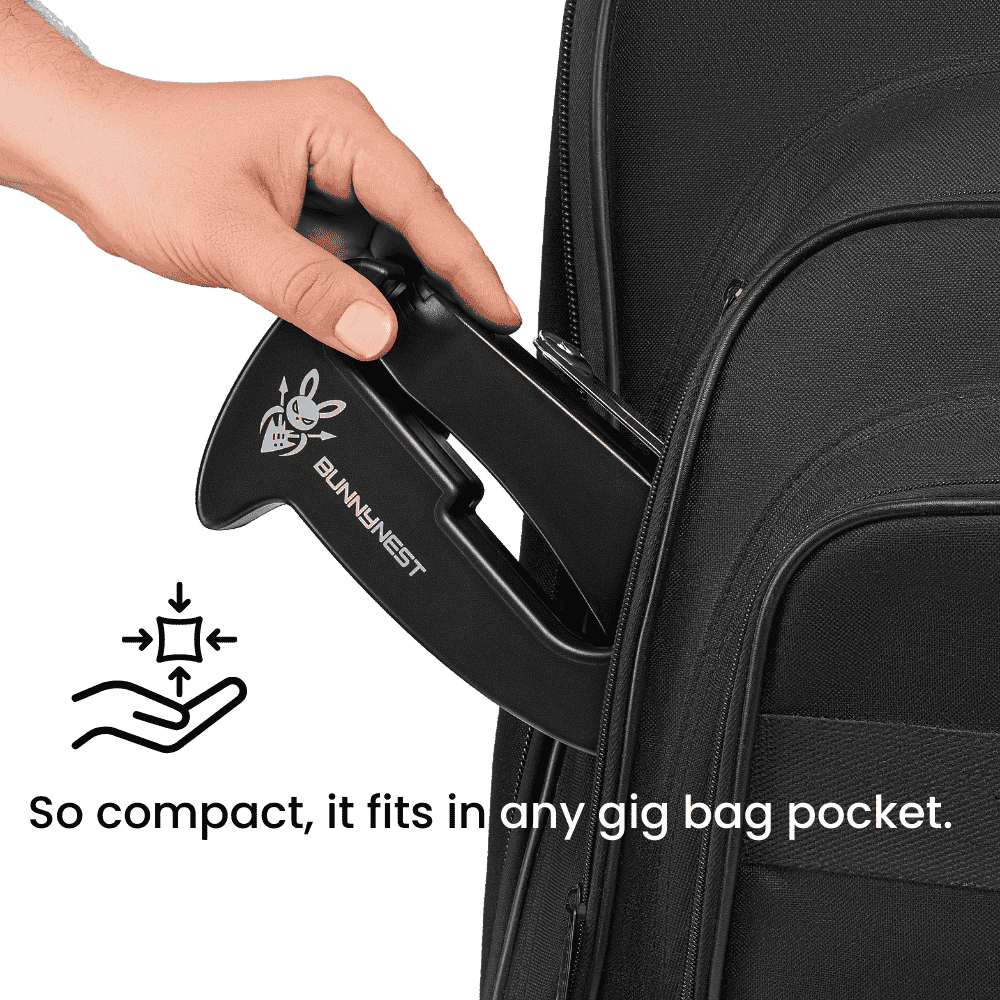 CFG BunnyNest, a lightweight portable folding guitar stand by Cable Free Guitar_ Fits all guitar types: electric, bass, acoustic, classic, and banjo_ Easily fits into your gig bag, ideal for musicians on the go_ Explore the versatility and convenience of the CFG BunnyNest