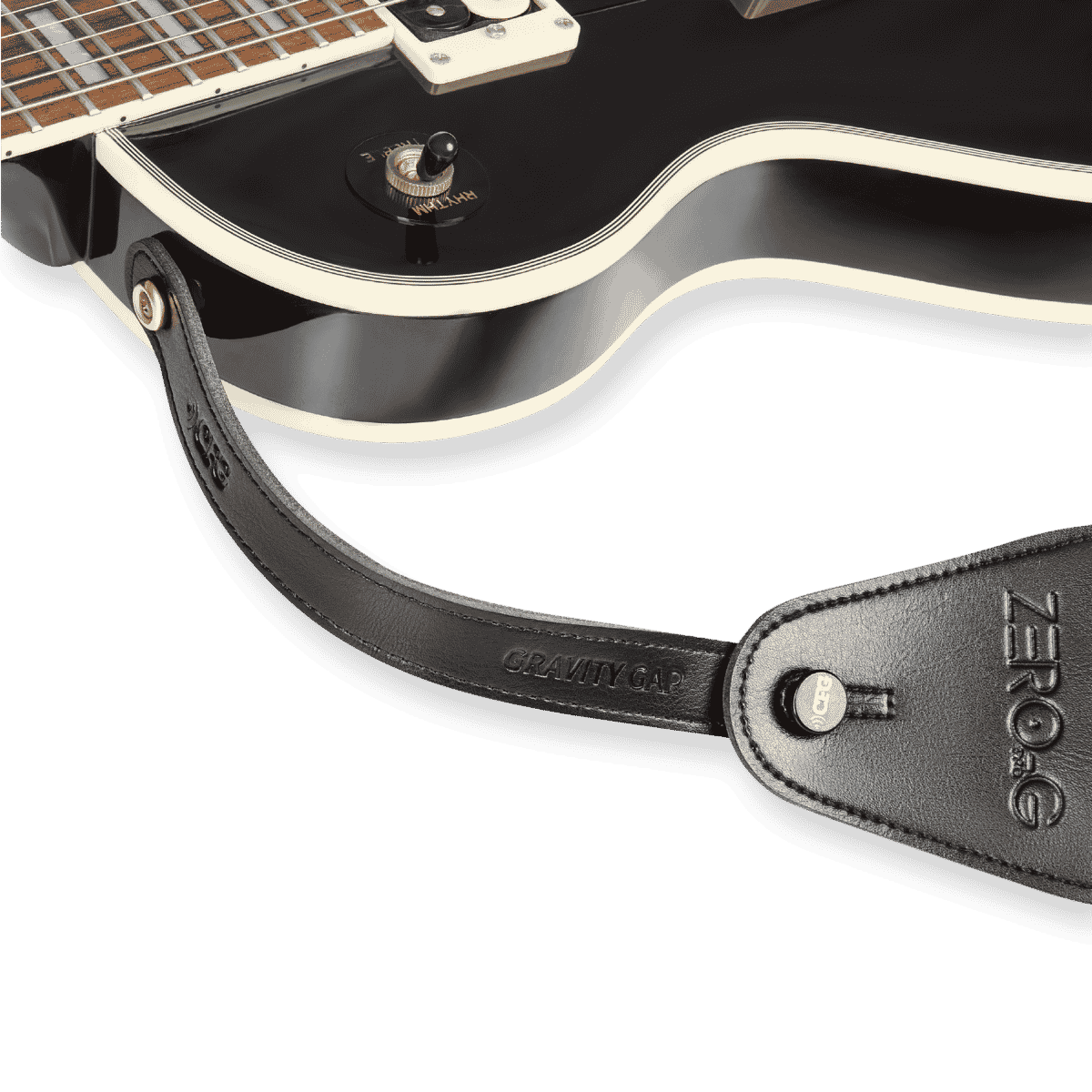 CFG Cable Free Guitar Gravity Gap strap extender installed between a guitar strap and strap button, adding extra length for lower playing positions while maintaining a secure connection