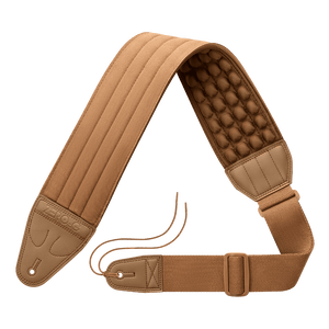 Brown guitar strap with textured padding on a transparent background ZERO-G Pro guitar and bass strap by CFG Cable Free Guitar neoprene padded comfort no pain strap belt weight high quality high-end aircell cushion 3d