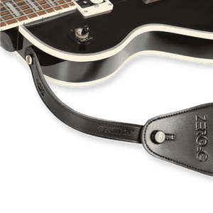 CFG Cable Free Guitar Gravity Gap strap extender installed between a guitar strap and strap button, adding extra length for lower playing positions while maintaining a secure connection