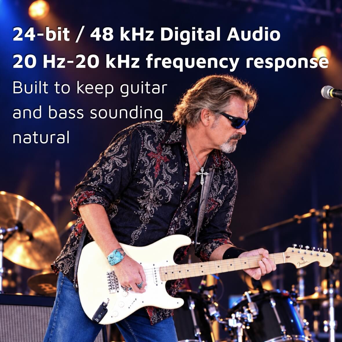 A man wearing sunglasses and a patterned shirt plays an electric guitar on a stage, with text overlay highlighting 24-bit / 48 kHz digital audio and 20 Hz-20 kHz frequency response CFG Cable Free Guitar UHF Nexus wireless guitar and bass system professional cable-free performance 7 seven channels no interference color coded black and white receiver transmitter freedom stage