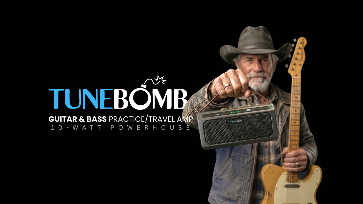 CFG cable free guitar TuneBomb guitar and bass practice travel amp 10-watt powerhouse, female guitarist in leather jacket holding the mini amp and electric guitar