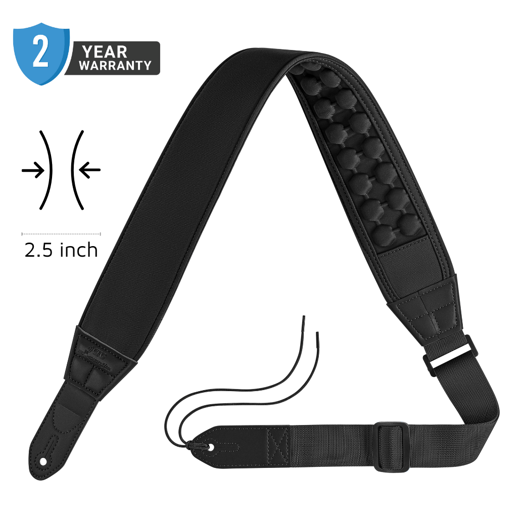 Black guitar strap with padding and a 2-year warranty badge on a green background ZERO-GRAVITY SLIM guitar and bass strap by CFG Cable Free Guitar neoprene padded comfort no pain strap belt weight high quality high-end aircell cushion 3d 